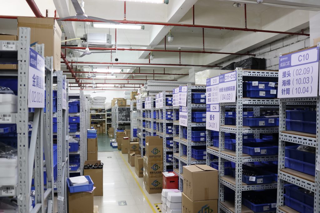 Shelving and materials in the JOHOPE warehouse