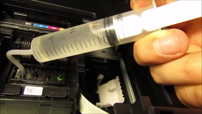 printhead cleaning with cleaning fluid and a syringe